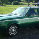 Amc Gremlin A Inusitada Historia Do Carro Desenhado Em Um Sa